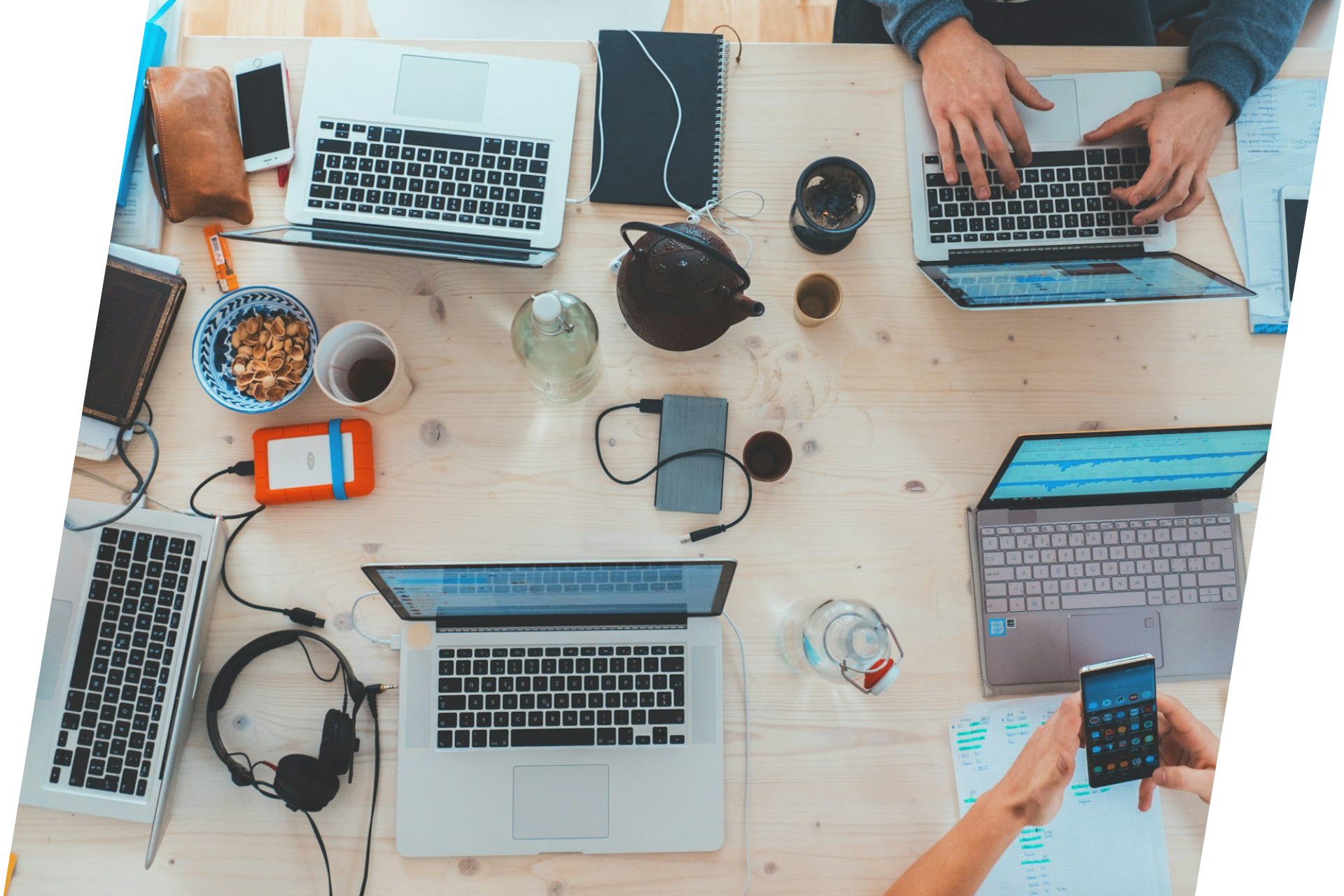 Finance recuiters at laptops around desk